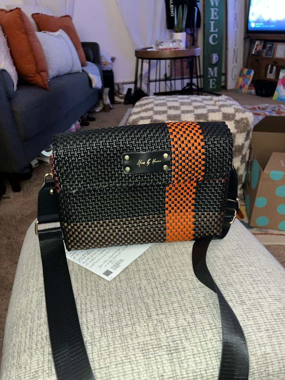 Maria by Herrera Woven Crossbody Bag Black and Orange Stripe